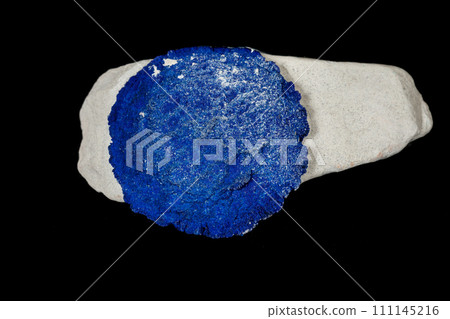 Macro mineral stone Azurite in siltstone against black background 111145216
