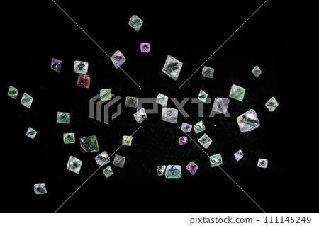 macro mineral fluorite stone on balck background macro mineral fluorite stone on balck background 111145249