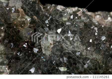 Macro stone mineral smoky quartz on a black background Macro stone mineral smoky quartz on a black background 111145261