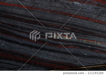 Macro stone Jespilit on a black background 111145284