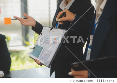 Business team meeting working with new startup project, discussion and analysis data the charts and graphs. Digital tablet, calculator, laptop computer using, Business finance and accounting concept. Business team meeting working with new startup project, discussion and analysis data the charts and graphs. Digital tablet, calculator, laptop computer using, Business finance and accounting concept. 111145474