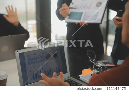 Business team meeting working with new startup project, discussion and analysis data the charts and graphs. Digital tablet, calculator, laptop computer using, Business finance and accounting concept. Business team meeting working with new startup project, discussion and analysis data the charts and graphs. Digital tablet, calculator, laptop computer using, Business finance and accounting concept. 111145475