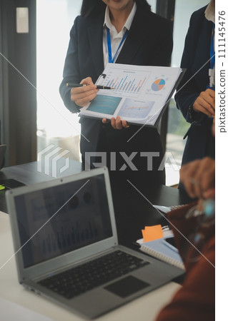 Business team meeting working with new startup project, discussion and analysis data the charts and graphs. Digital tablet, calculator, laptop computer using, Business finance and accounting concept. Business team meeting working with new startup project, discussion and analysis data the charts and graphs. Digital tablet, calculator, laptop computer using, Business finance and accounting concept. 111145476