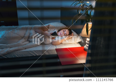 Someone is peeping through the blinds on window... - Stock Photo