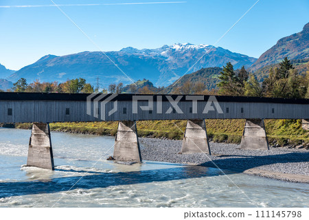 The historic old Rhine bridge between Liechtenstein and Switzerland The historic old Rhine bridge between Liechtenstein and Switzerland 111145798