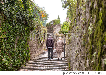 Enchanted alleyway in the scenic town of Bellagio at lake Como Enchanted alleyway in the scenic town of Bellagio at lake Como 111145840