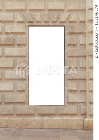 Vertical blank billboard set in a textured sandstone wall, perfect for advertisements or custom content in a historical or urban setting. Empty, copy space for your picture, text. Billboard mock up. 111146374