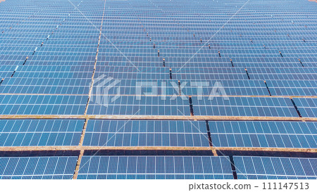 Solar panel, photovoltaic, alternative electricity source. concept of sustainable resources. High angle, elevated view of solar panels on an energy farm 111147513