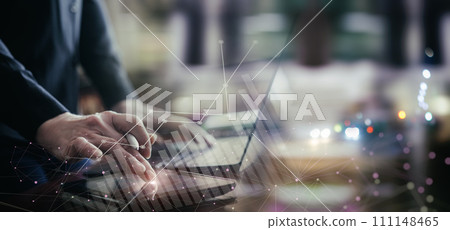 Businessman working online on computer with financial markets. 111148465