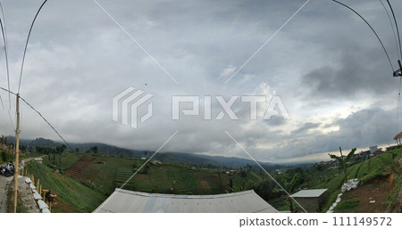 The road is in the middle of forests and mountains which are cloudy and cool The road is in the middle of forests and mountains which are cloudy and cool 111149572