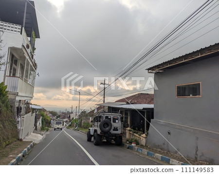 Twilight atmosphere on a beautiful village street in the afternoon 111149583