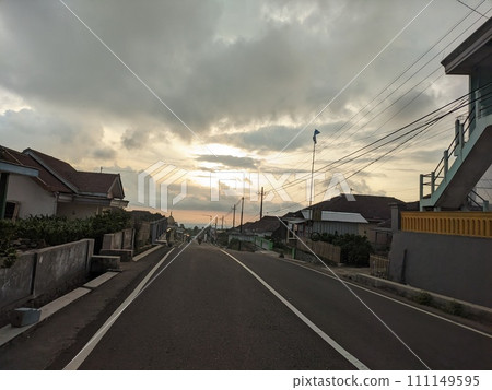 Twilight atmosphere on a beautiful village street in the afternoon 111149595