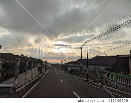 Twilight atmosphere on a beautiful village street in the afternoon 111149596