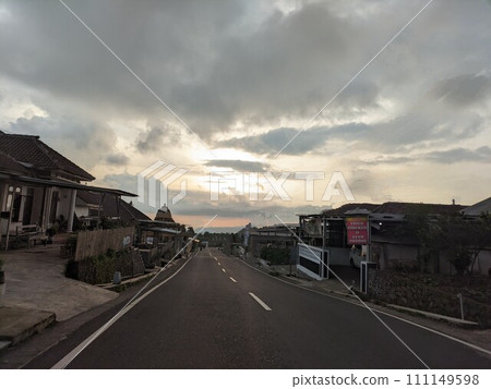 Twilight atmosphere on a beautiful village street in the afternoon Twilight atmosphere on a beautiful village street in the afternoon 111149598