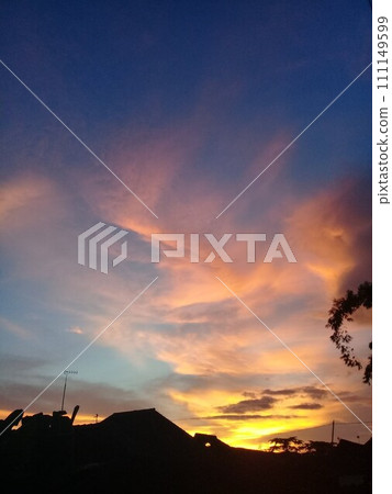 Beautiful twilight and clouds with golden yellow sunlight 111149599
