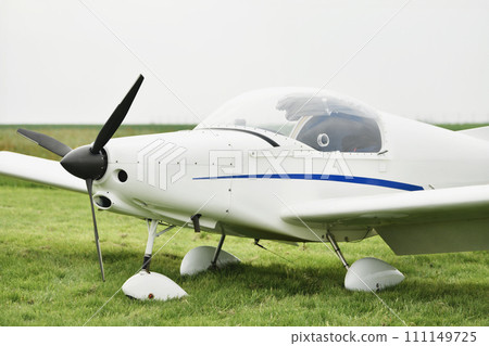 Mini white airplane at the airfield 111149725