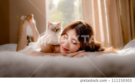 Young woman sleeping in the bedroom 111150303