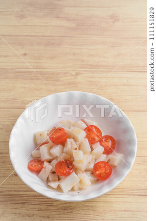 Japanese yam and tomato salad 111151829