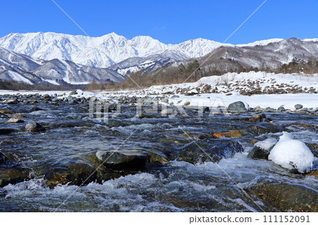 Hakuba in winter - Northern Alps seen from the foot of the mountain Hakuba in winter - Northern Alps seen from the foot of the mountain 111152091
