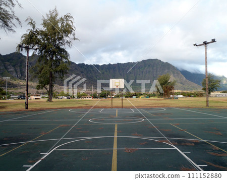 Empty Outdoor Basketball Court in Waimanalo 111152880