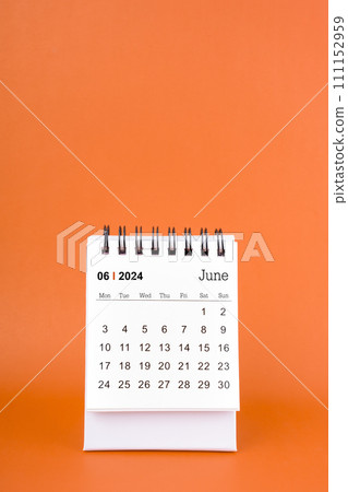 Vertical of June 2024 table calendar on orange background. 111152959
