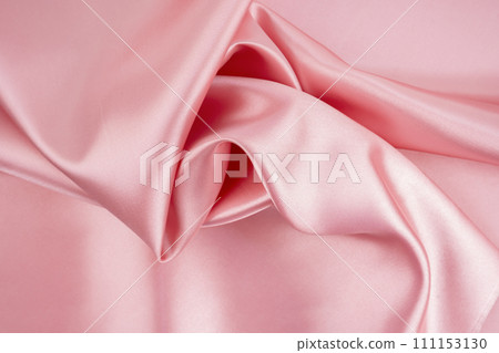 Rose Gold silk satin fabric texture background. 111153130