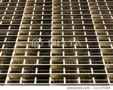 Balconies and Windows of Building looking upwards Balconies and Windows of Building looking upwards 111154894