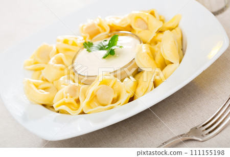 Ravioli with sauce Ravioli with sauce 111155198