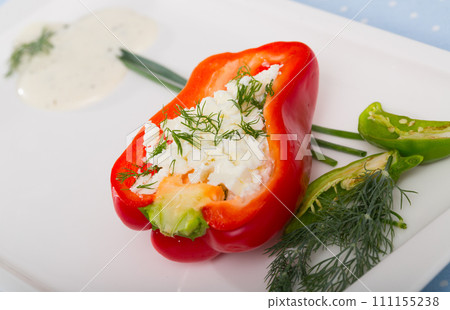 Stuffed half of pepper with brynza, dish of Bulgarian cuisine Stuffed half of pepper with brynza, dish of Bulgarian cuisine 111155238