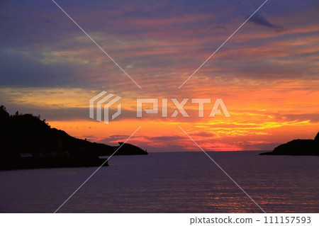 Nishina fishing port bathed in the setting sun 111157593