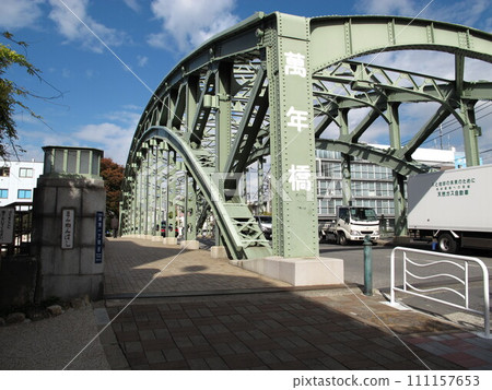 Mannenbashi Bridge spanning the Onagigawa River in Koto Ward, Tokyo 111157653