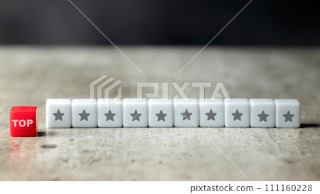 A row of small cubes with the top text and star symbol A row of small cubes with the top text and star symbol 111160228