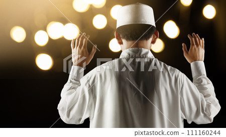 A Muslim man in a praying position (salat) 111160244