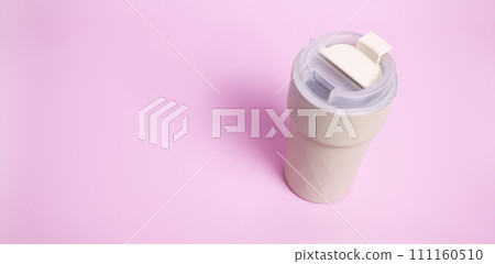 Banner Travel Coffee Beige Mug, Thermo Hot Coffee Tumbler, Reusable Tea Mug with Seal Lid, Buckle, Vacuum Stainless Steel Cup on Pink Background, Mockup. Copy Space. Cold or Hot Beverages Banner Travel Coffee Beige Mug, Thermo Hot Coffee Tumbler, Reusable Tea Mug with Seal Lid, Buckle, Vacuum Stainless Steel Cup on Pink Background, Mockup. Copy Space. Cold or Hot Beverages 111160510