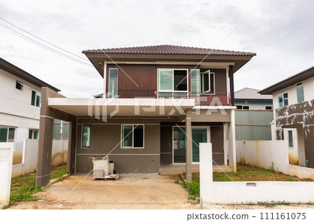 construction residential new house in progress at building site construction residential new house in progress at building site 111161075