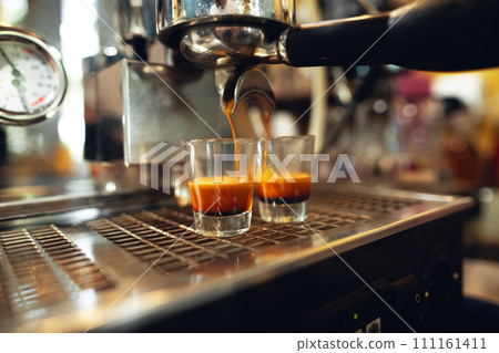 Coffee shot,Coffee machine pouring out espresso shot 111161411