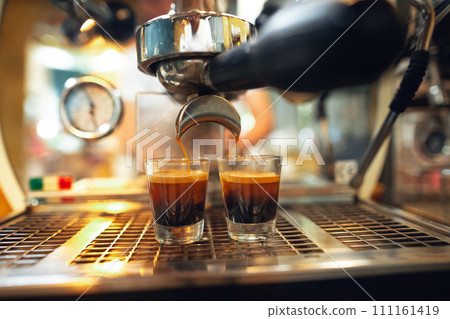 Coffee shot,Coffee machine pouring out espresso shot Coffee shot,Coffee machine pouring out espresso shot 111161419