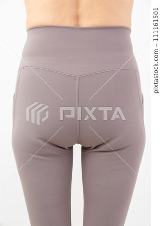 Hips of a middle-aged woman who lost weight through dieting 111161501