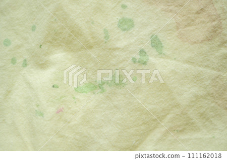 dirty color stain on yellow fabric texture background 111162018