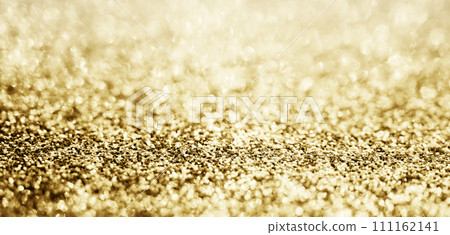 Abstract gold glitter sparkle with bokeh background Abstract gold glitter sparkle with bokeh background 111162141