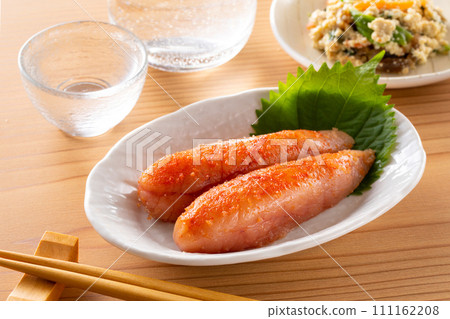Karashi mentaiko and cold sake Karashi mentaiko and cold sake 111162208