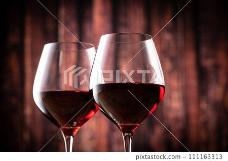 A toast with red wine A toast with red wine 111163313