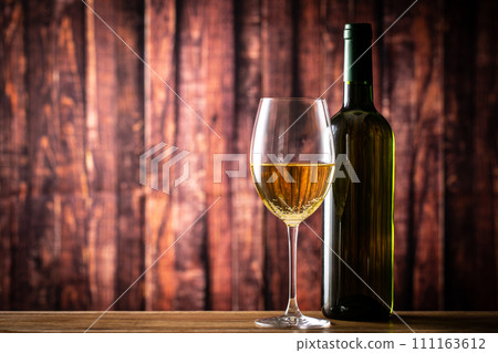 White wine and wine bottle White wine and wine bottle 111163612