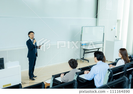 Businessman speaking at a seminar Businessman speaking at a seminar 111164890