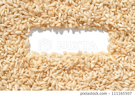 A rectangle frame captures a heap of brown basmati rice on a white background A rectangle frame captures a heap of brown basmati rice on a white background 111165507