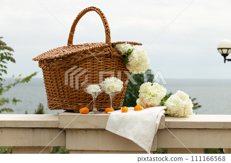 A picnic for two, in the summer, with a view of the sea. A picnic for two, in the summer, with a view of the sea. 111166568