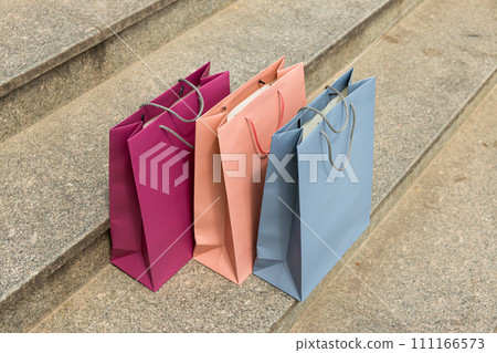 Shopping bags, on the street, on the background of steps. 111166573