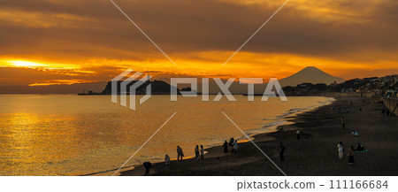Scenery Kamakura Yuigahama Beach with Kamakura city and Fujisan mountain. Twilight silhouette Mount Fuji behind Enoshima island at Kamakura, Kanagawa, Japan. Landmark for tourist attraction near tokyo Scenery Kamakura Yuigahama Beach with Kamakura city and Fujisan mountain. Twilight silhouette Mount Fuji behind Enoshima island at Kamakura, Kanagawa, Japan. Landmark for tourist attraction near tokyo 111166684