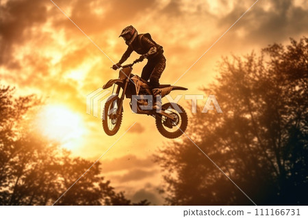 Photo of motocross jump silhouette with natural background Photo of motocross jump silhouette with natural background 111166731