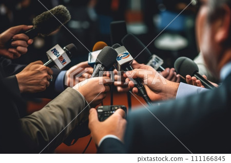 Professional Media interview hand a hold microphone after a press conference Professional Media interview hand a hold microphone after a press conference 111166845